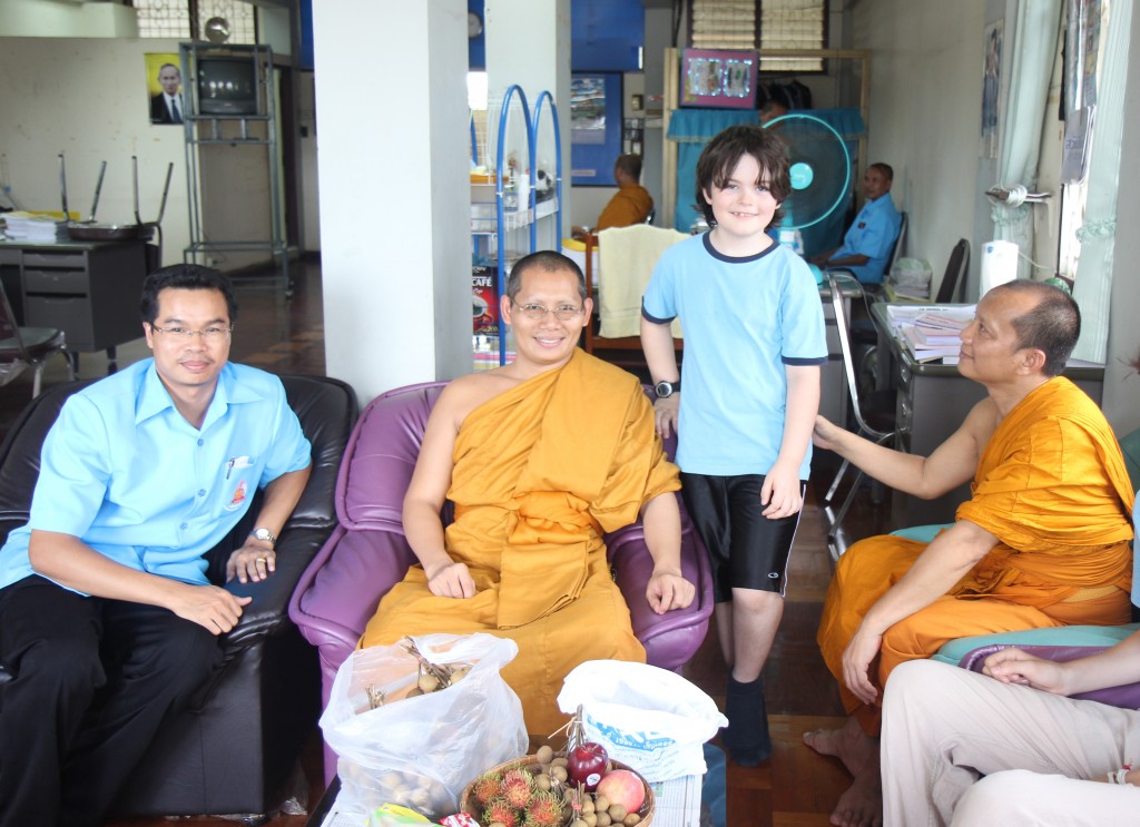 During a break with teachers and administrators at the monastery school in Nong Khai