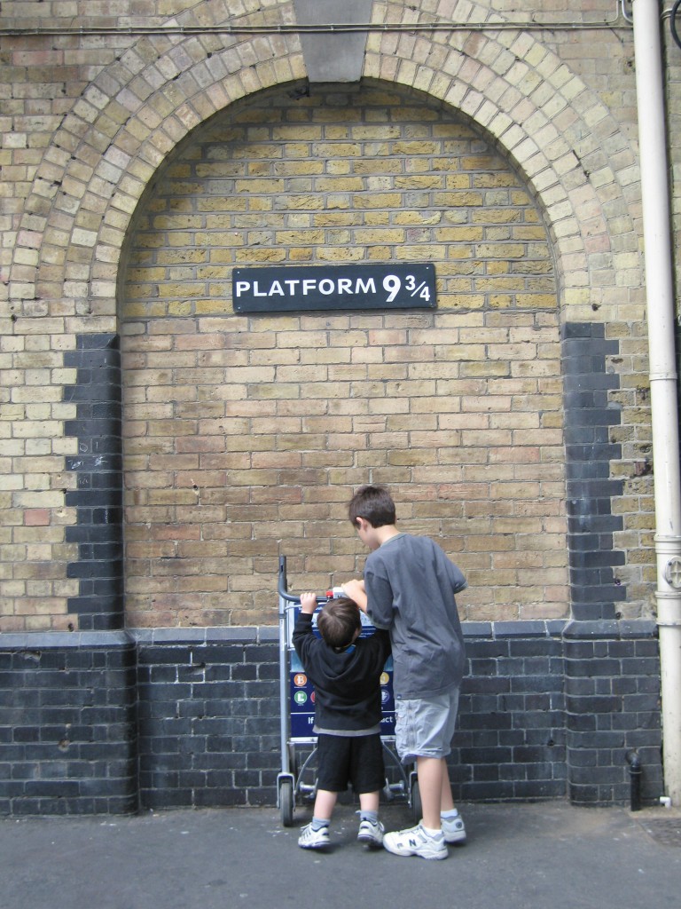 Helping an underage wizard get through the barrier to Platform 9 3/4, Kings Cross Station, London